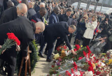 Photo of Belarusian ambassador lays flowers at terrorist attack site outside Moscow