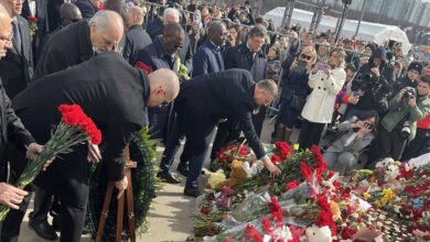 Photo of Belarusian ambassador lays flowers at terrorist attack site outside Moscow
